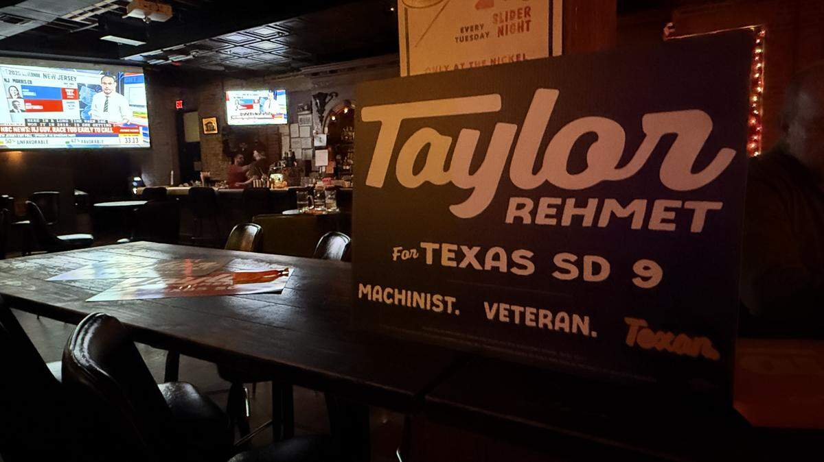 A sign supporting Taylor Rehmet is displayed at Nickel City in Fort Worth, where he hosted an Election Night watch party Tuesday, Nov. 4, 2025.