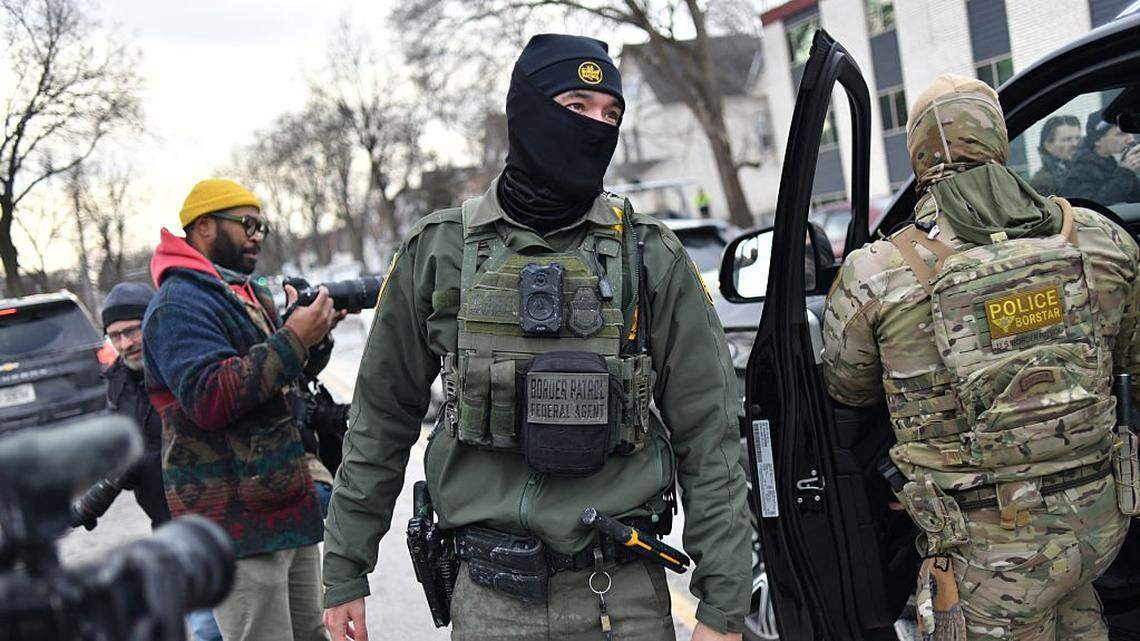 US Customs and Border Protection agents patrol a neighborhood during immigration enforcement activity in Minneapolis, Minnesota, on Jan. 11, 2026.