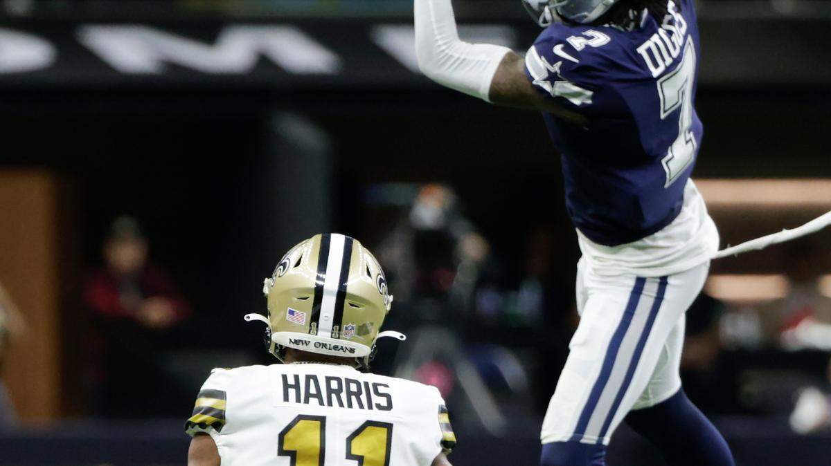 Cornerback Trevon Diggs goes up for one of the Dallas Cowboys’ four interceptions they had in their 27-17 win over the Saints in New Orleans Thursday night.