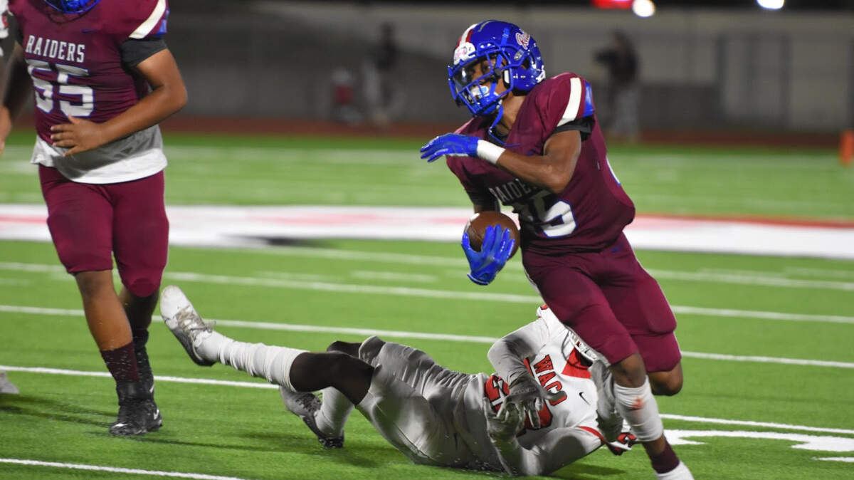 Martavious Boswell (25) runs the ball for the Fort Worth Southwest Raiders after his second touchdown of the night against Waco during a high school football game at Clark Stadium on Friday.