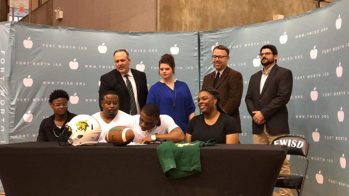 Benbrook RB Quintan Jackson signs his national letter of intent with Southern Nazarene, Wednesday Feb. 6, 2019.
