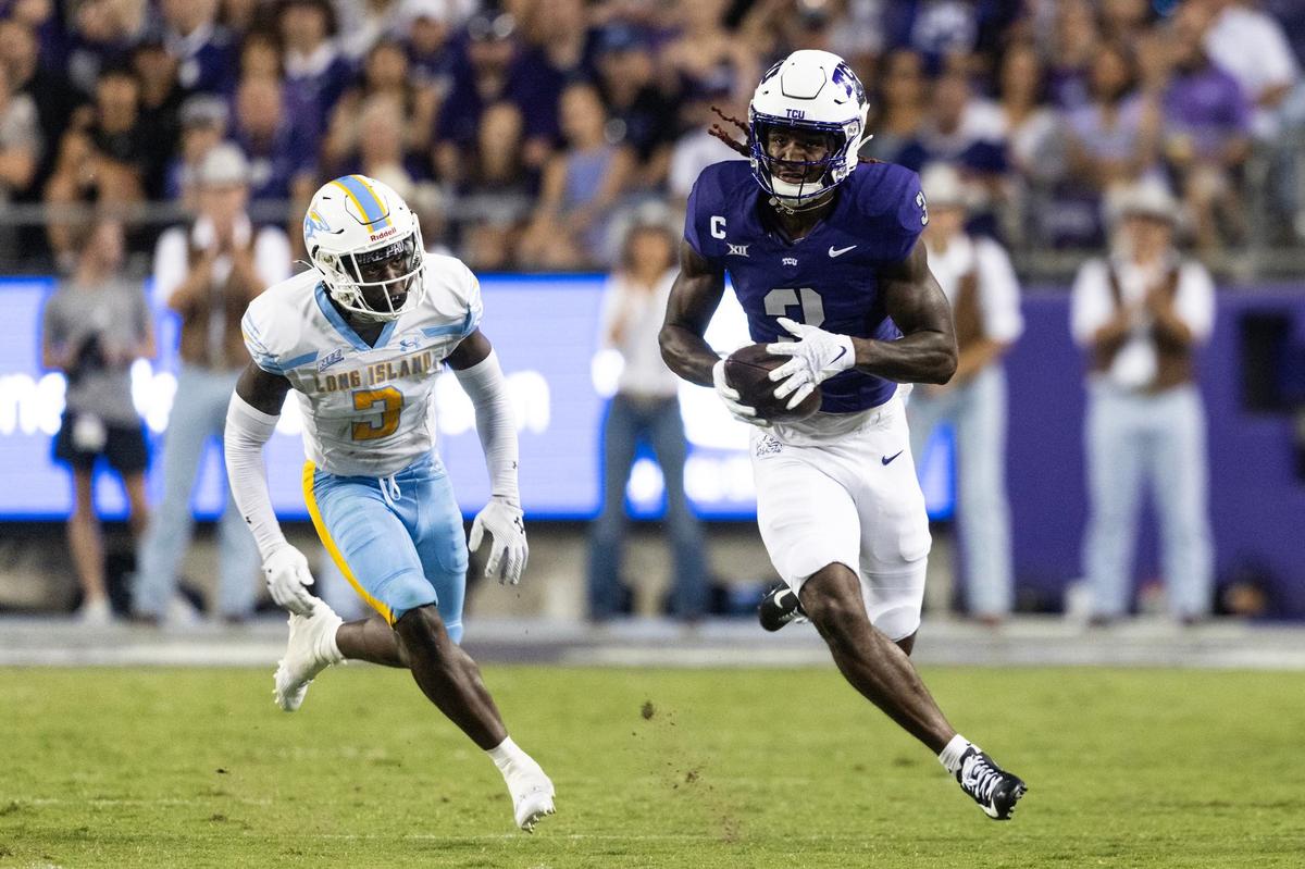 TCU wide receiver Savion Williams (3) runs up field after a reception in the second quarter of a non-conference NCAA game between Long Island University and Texas Christian University at Amon G Carter Stadium in Fort Worth on Saturday.