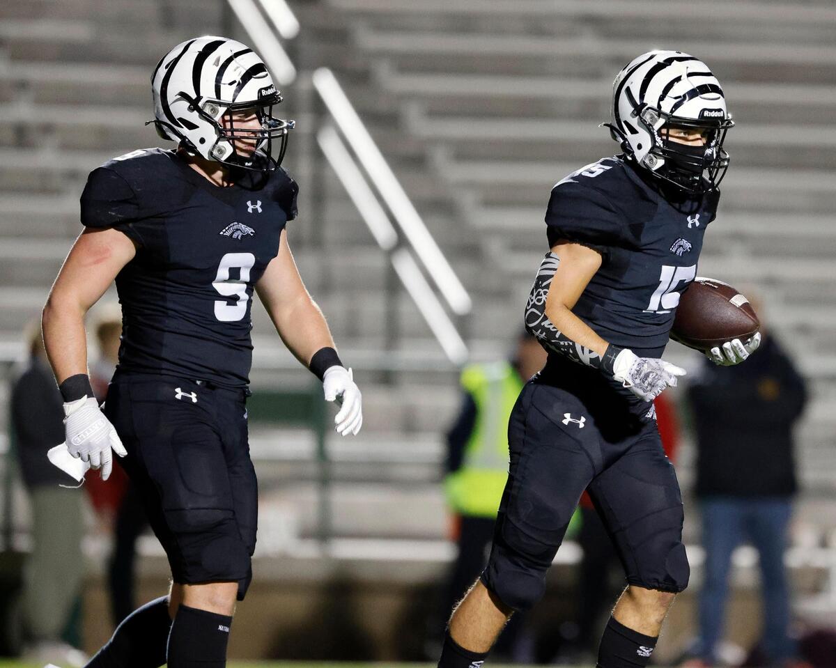 Grandview wide receiver Anthoney Berrones (15) carries the ball off field after scoring a two-point-conversion to tie the game at 35 at the half during a UIL Class 3A Division 1 area round playoff football game at Mesquite Memorial Stadium in Mesquite, Texas, Thursday, Nov. 16, 2023. (Special to the Star-Telegram Bob Booth)