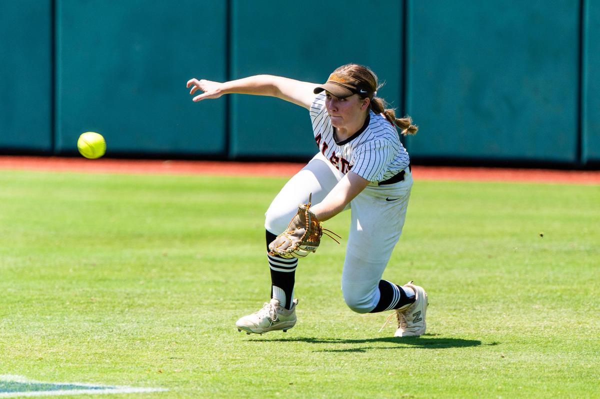 Marissa Powell makes a diving catch during the 5A UIL State Softball semifinal between Aledo and Georgetown in Austin Texas, on June 3rd, 2021.