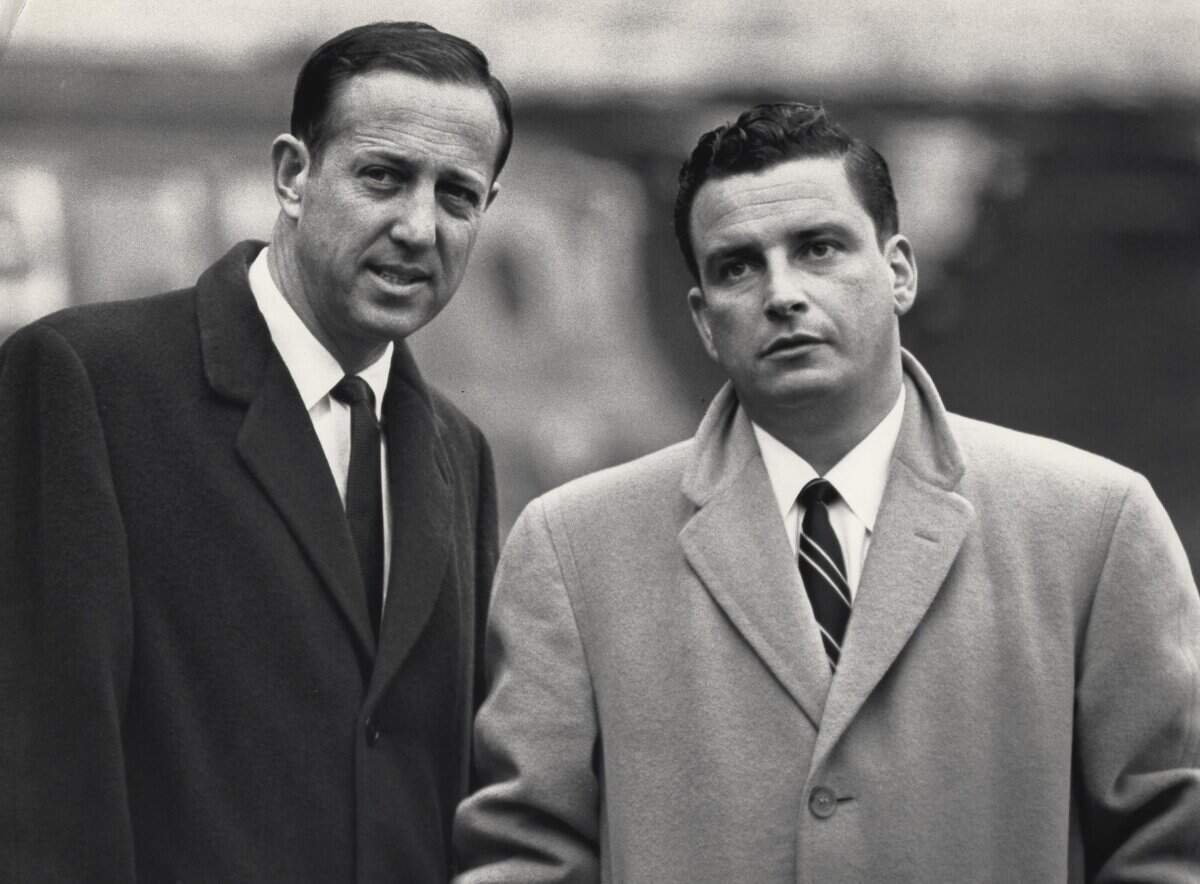 NFL commissioner Pete Rozelle, left, and Cleveland Browns president Art Modell talk before the 1964 NFL Championship Game at Cleveland Stadium on Dec 27, 1964. The Browns pulled the upset and beat the Baltimore Colts 27-0.