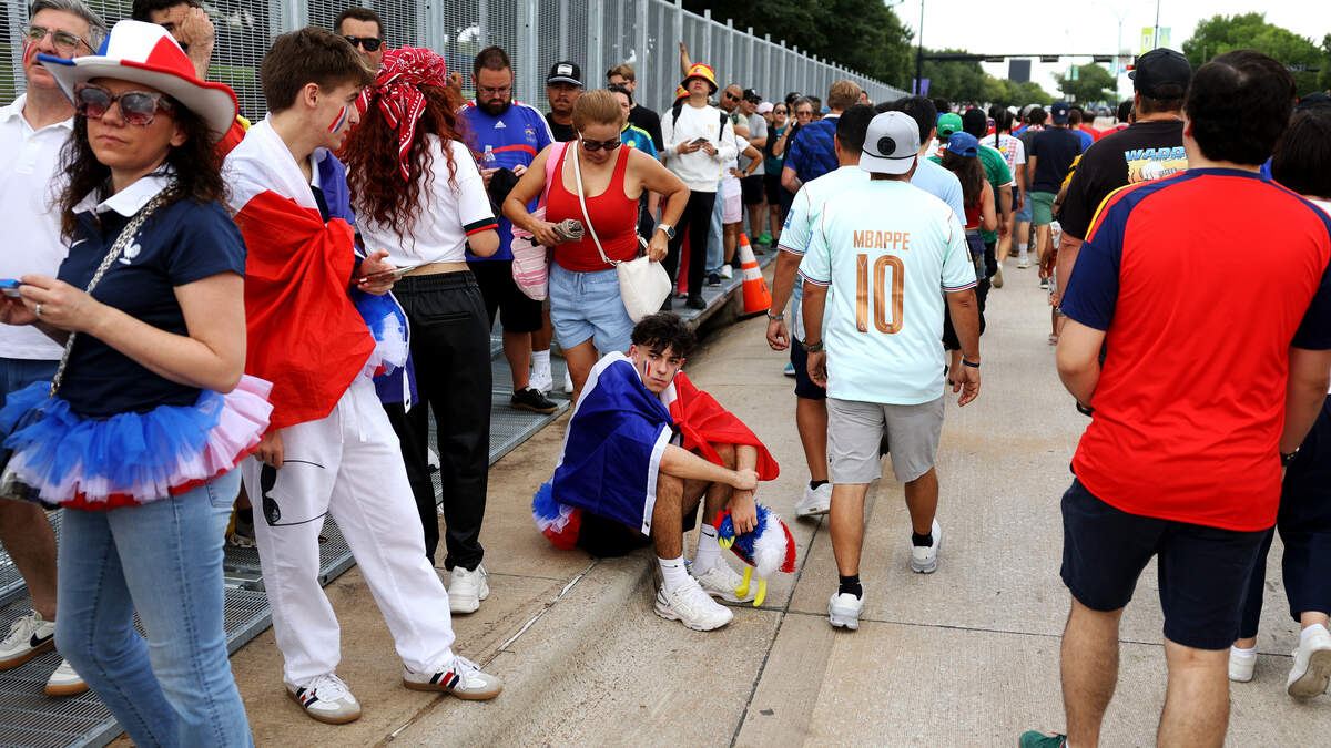 Fans wait in line to enter Dallas Stadium for the 2025 FIFA World Cup semifinal between France and Spain on Tuesday, July 14, 2026, in Arlington.