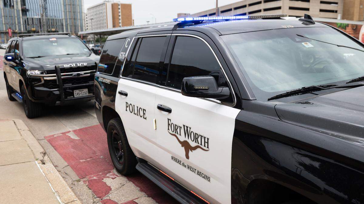 Police cars outside Fort Worth Central Station downtown on July 3. Two people were injured in a stabbing on a bus at the station on Thursday, Oct. 2, and a suspect was arrested.