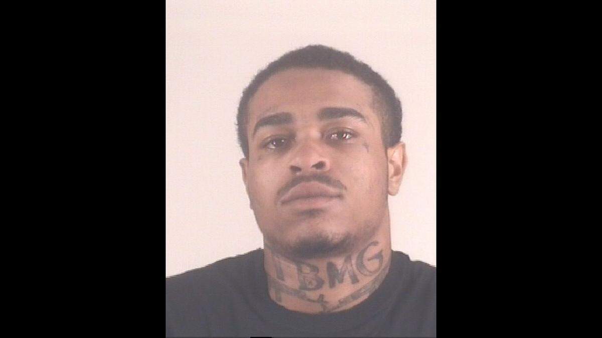 Caleb Houston, 20, is accused of engaging in organized criminal activity-aggravated assault with a deadly weapon in connection with a shooting on May 10 that wounded five. 