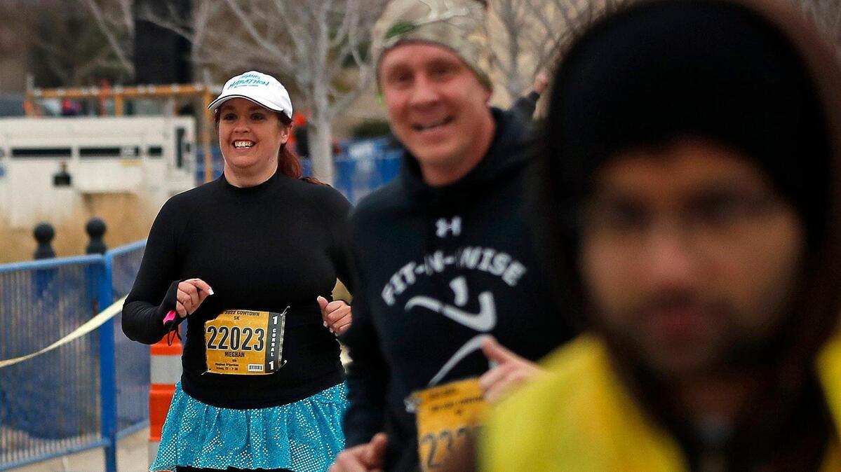Meghan O’Gorman runs the final leg of the 5K during the 44th annual running of The Cowtown at Will Rogers Memorial Center in 2022.