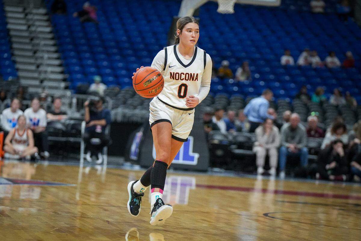 Nocona’s Megyn Meekins dribbles up the court against Wellington in a Class 2A state semifinal on Friday, March 1, 2024 at the Alamodome in San Antonio, Texas. Nocona rallied to win 44-42 with Meekins leading all scorers with 19 points.