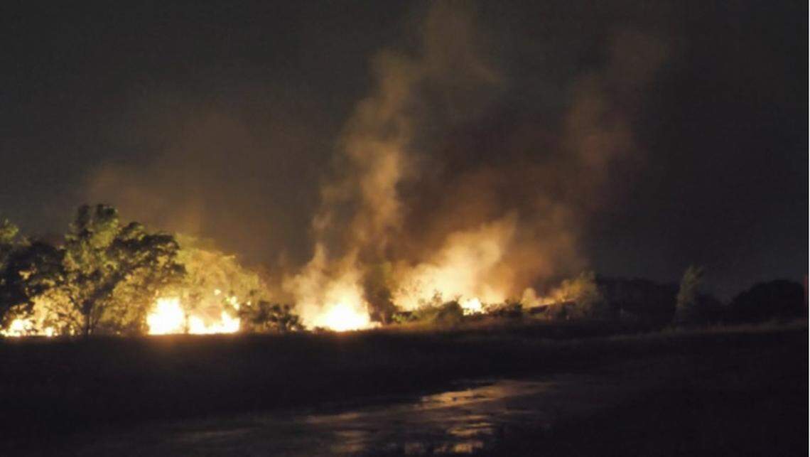 Fort Worth firefighters battled a large fire early Wednesday after several train cars derailed and caught fire.