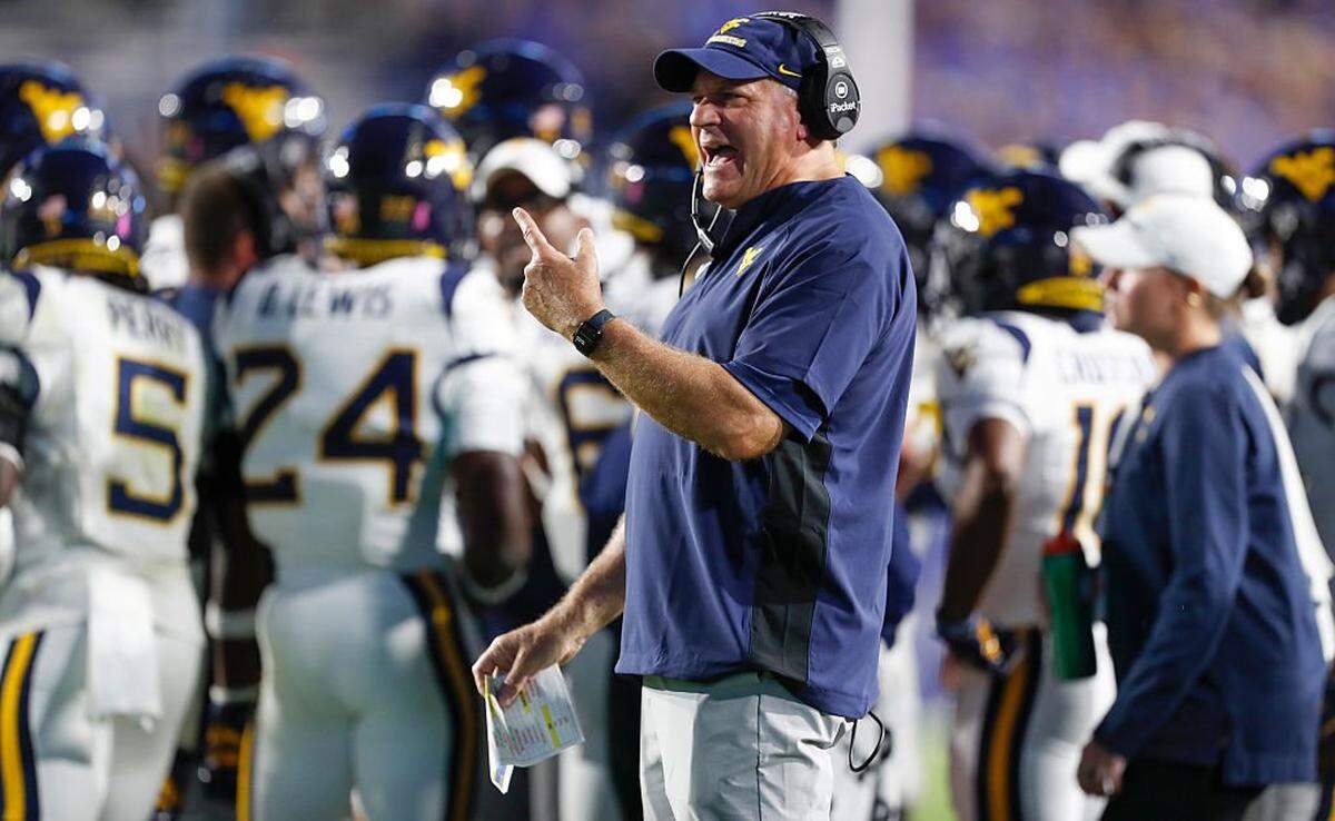 PROVO, UT - OCTOBER 3: Rich Rodriguez head coach of the West Virginia Mountaineers argues a call with an official during the first half their game against the Brigham Young Cougars at LaVell Edwards Stadium on October 3, 2025 at Provo, Utah. (Photo by Chris Gardner/Getty Images)