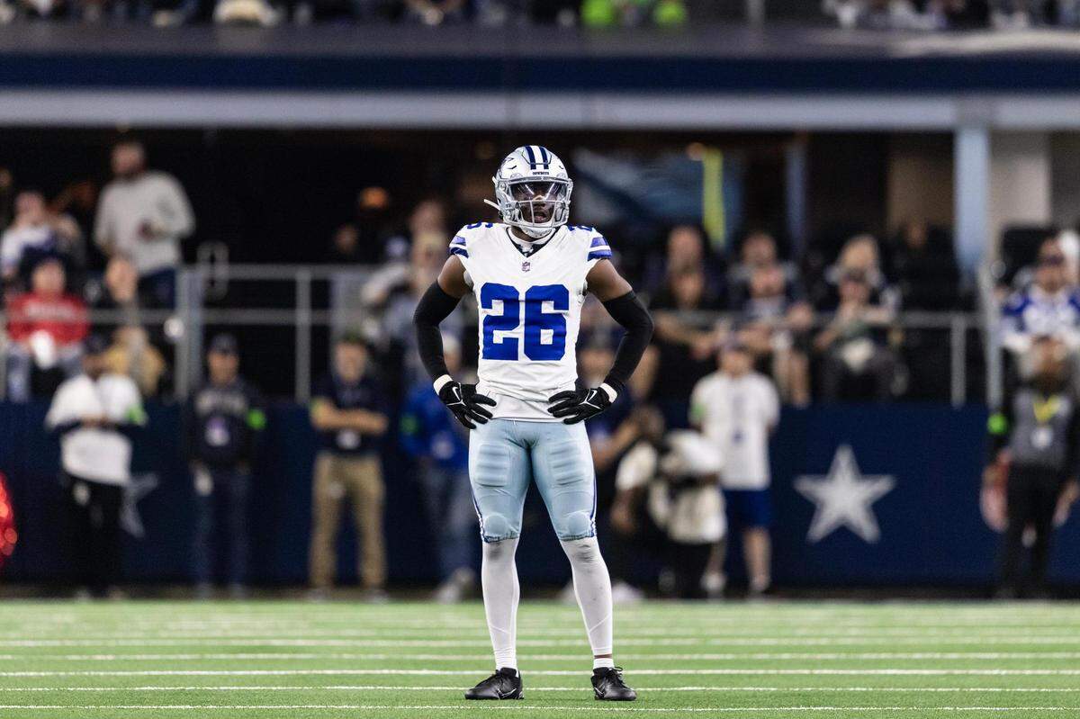 Cowboys defensive back DaRon Bland (26) takes a rest during the second quarter of an NFL game between the Dallas Cowboys and the Seattle Seahawks at AT&T Stadium in Arlington on Thursday, Nov. 30, 2023.