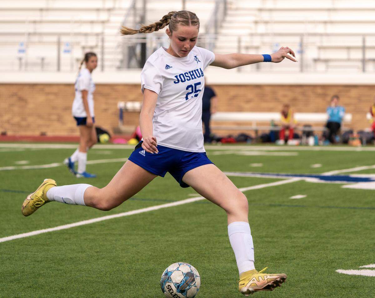 Joshua’s Kaitlyn Rush moves the ball up the pitch against Justin Northwest in a Class 5A area-round girls soccer match on Friday, March 29, 2024 at Boswell High School in Fort Worth ,Texas. Joshua defeated Northwest 4-1.
