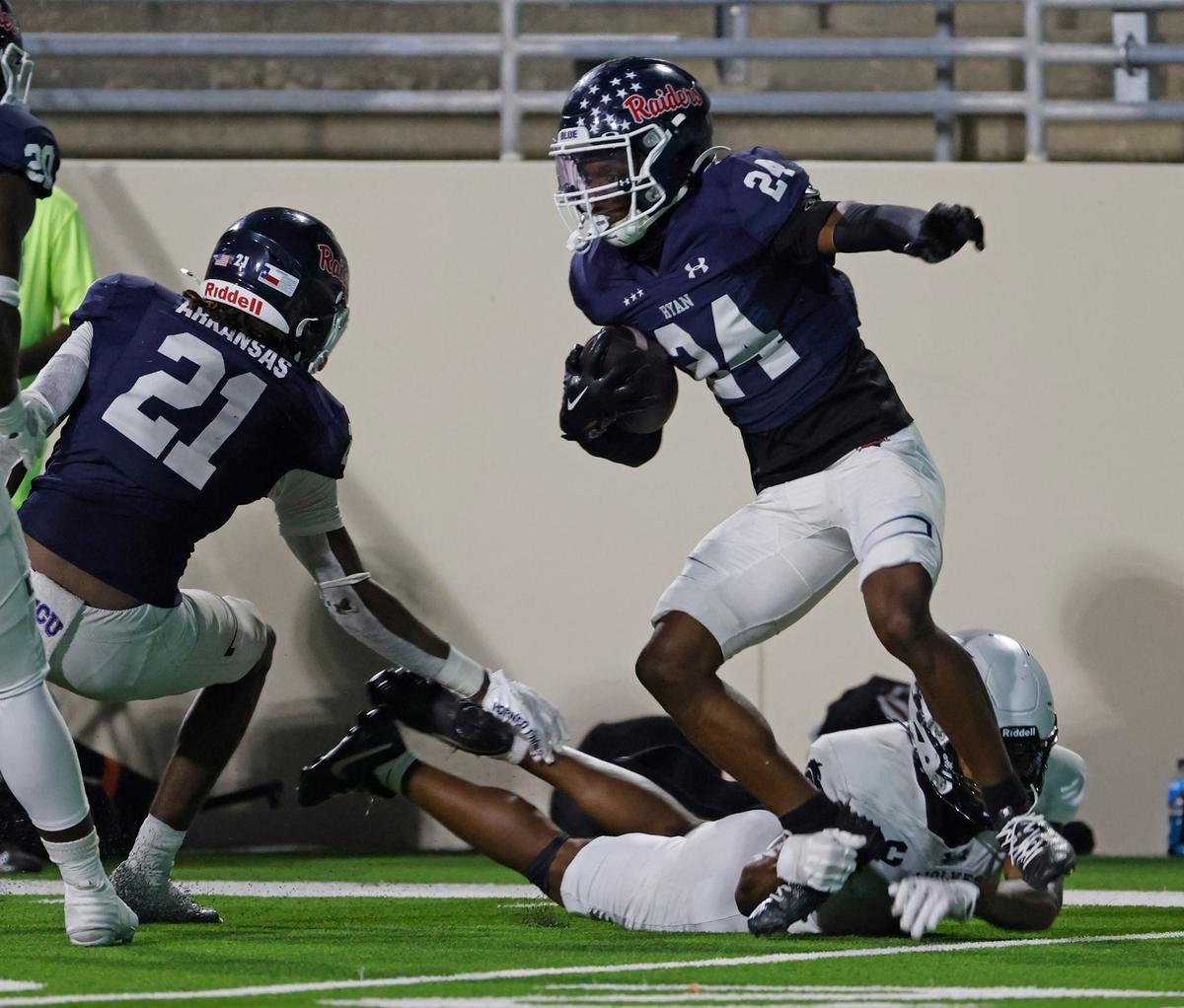 Denton Ryan defensive back Caleb Parks (24) intercepts a Timberview pass during a UIL football game at C.H. Collins Activity Complex in Denton, Texas, Thursday, Sept. 05, 2024.