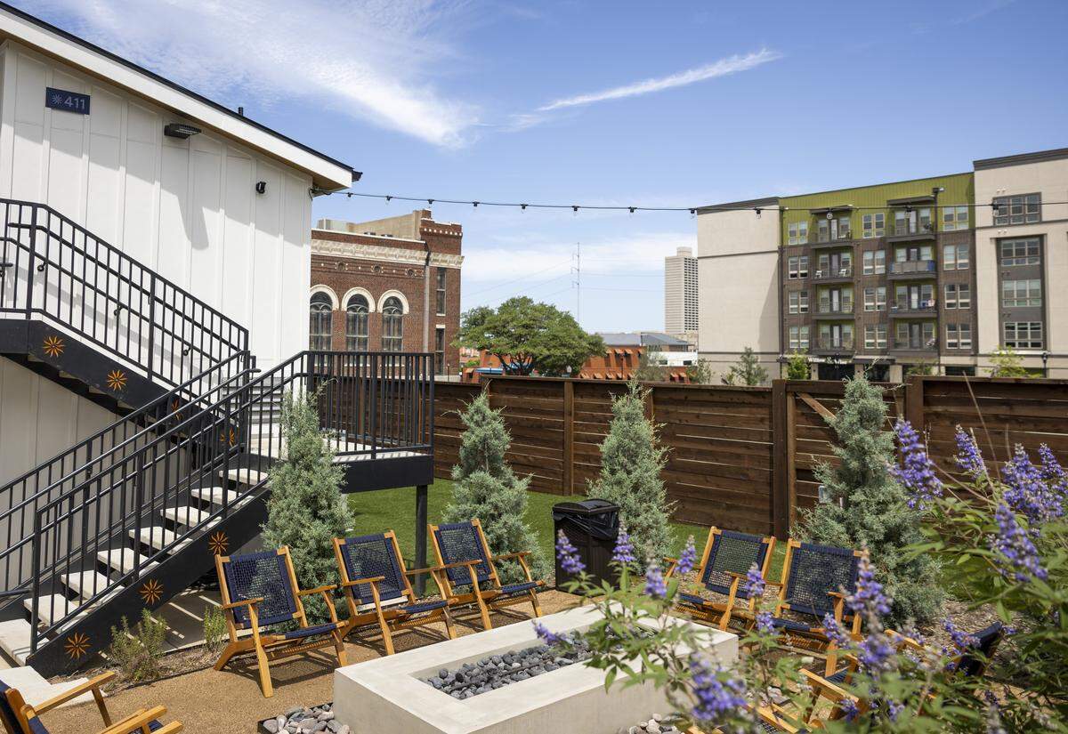 One of Hotel SOMA's fire pits is a place where guests can gather, on Thursday, May 7, 2026 in Fort Worth, Texas. The rooms are centered around a courtyard where guests have access to a pickleball court, fire pits and yard games.