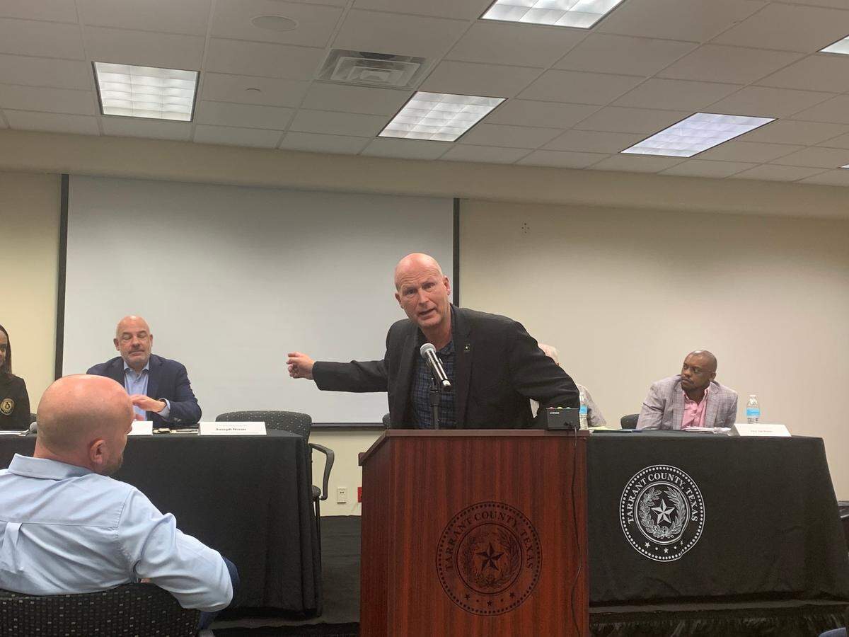 State Rep. Tony Tinderholt speaks at a  town hall meeting on Tarrant County redistricting.