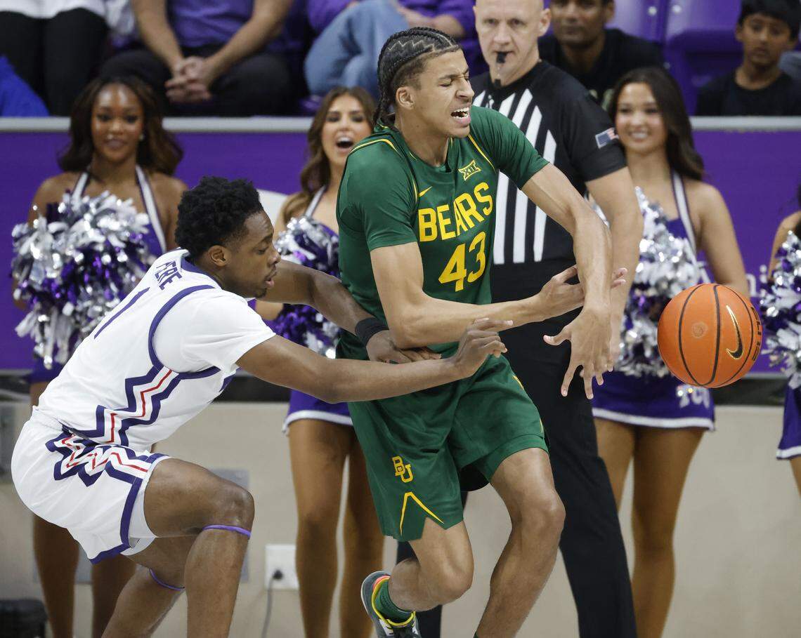 TCU guard Jayden Pierre (1) knocks the ball away from Baylor guard Cameron Carr (43) during the first half of a NCAA basketball game between Baylor University and TCU at Schollmaier Arena in Fort Worth, Texas, Saturday Jan. 03, 2026