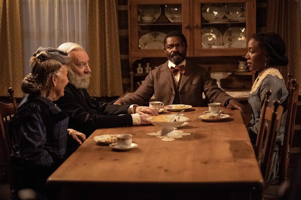 Donald Sutherland as Judge Parker, David Oyelowo as Bass Reeves and Lauren Banks as Jennie Reeves in Lawmen: Bass Reeves streaming on Paramount+, 2023.