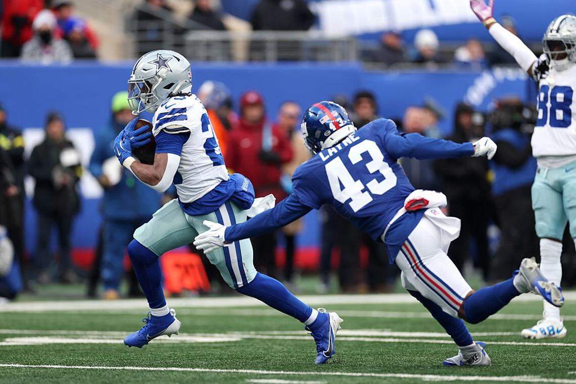 EAST RUTHERFORD, NEW JERSEY - JANUARY 04: Jaydon Blue #23 of the Dallas Cowboys runs for a first quarter touchdown against the New York Giants at MetLife Stadium on January 04, 2026 in East Rutherford, New Jersey. (Photo by Al Bello/Getty Images)