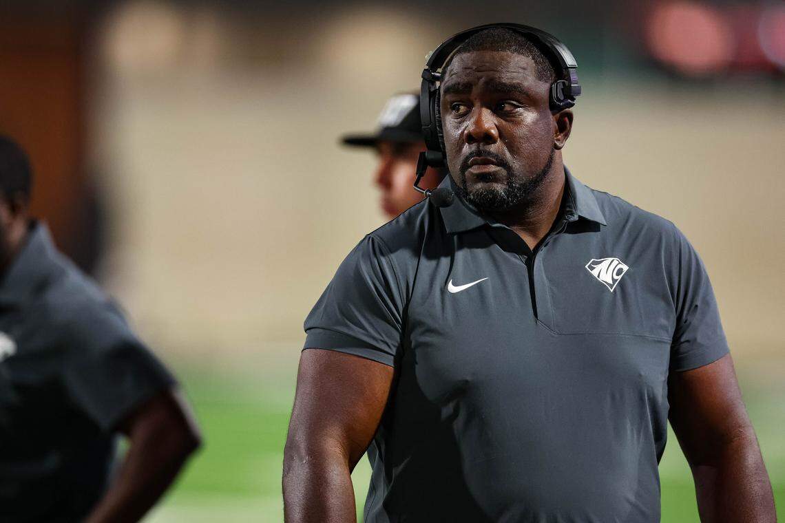 North Crowley head coach Ray Gates stares at his team following a timeout during the fourth quarter in a non-district game between North Crowley and Rockwall at Crowley ISD Stadium in Crowley, Texas on Sept. 18, 2025.