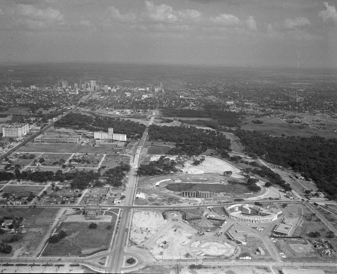 Oct. 10, 1938: Aerial view of construction of W. Lancaster Ave. bridge, looking east toward downtown. Montgomery Ward, Casa Manana-Frontier Centennial buildings and construction of Farrington Field in lower right.
