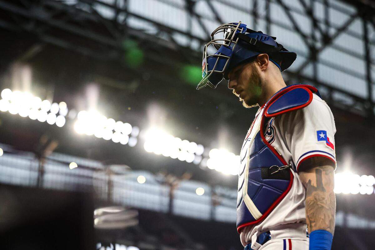 Texas Rangers catcher Jonah Heim (28) heads to the dugout before their regular season match up against the Tampa Bay Rays at Globe Life Field in Arlington, Texas on Wednesday, July 19, 2023.
