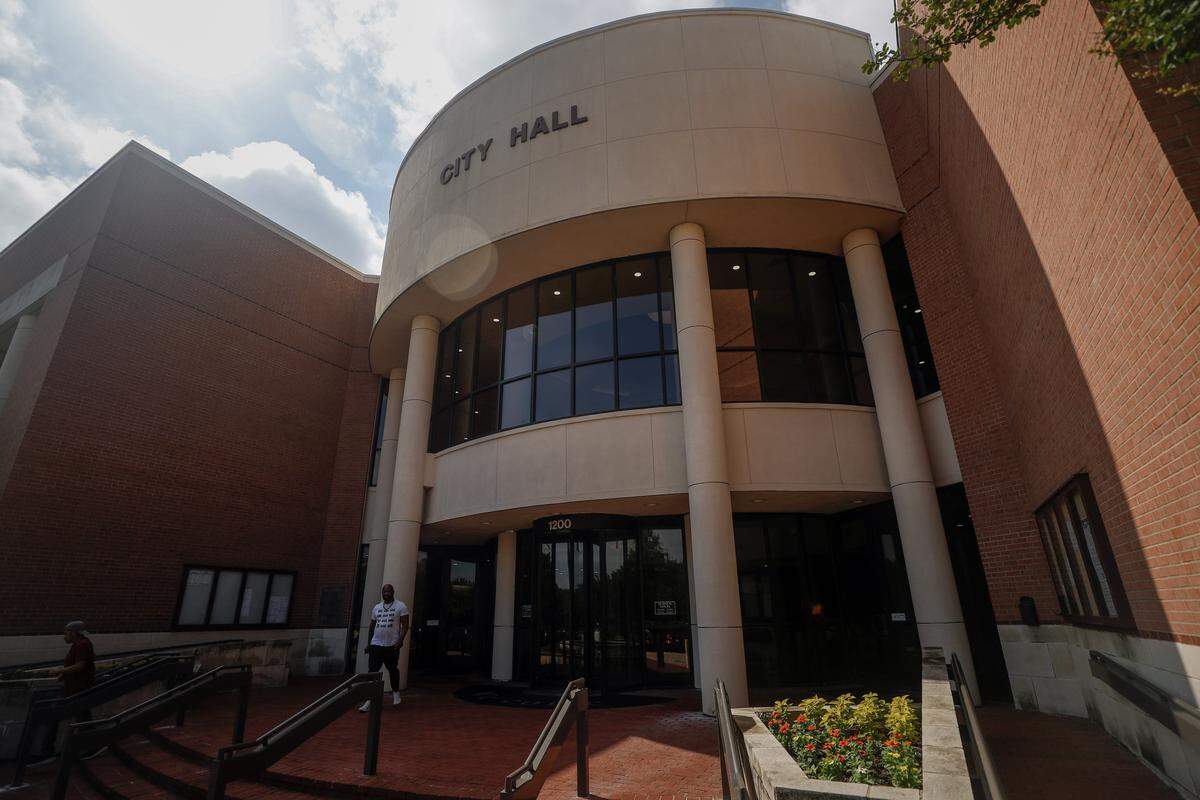 People walk out of Mansfield City Hall on June 3, 2026