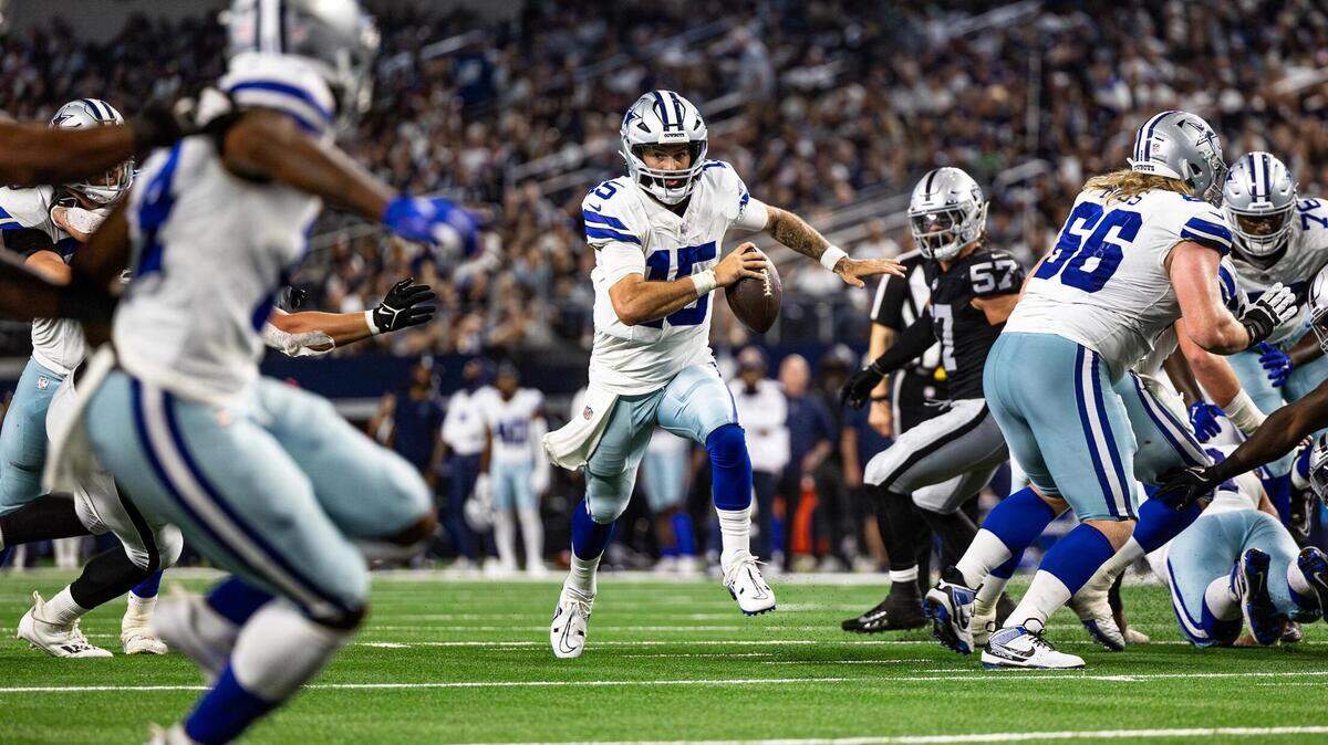 Dallas Cowboys quarterback Will Grier (15) rushes in for a touchdown in the second half of a preseason game against the Las Vegas Raiders at AT&T Stadium in Arlington, Texas on Saturday, Aug. 26, 2023.
