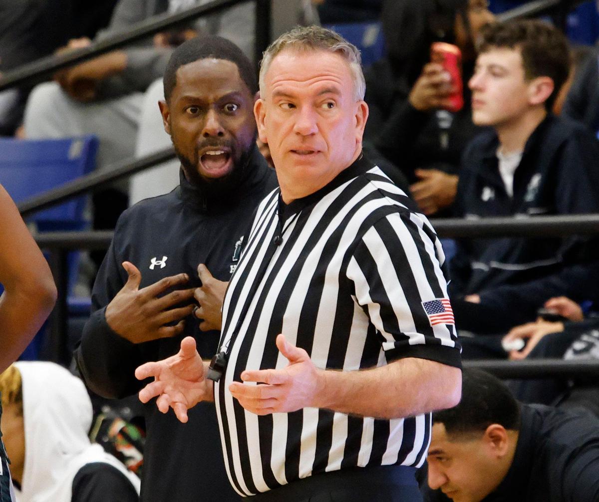 Lakeridge head coach Cornelius Mitchell has a few words with an official during a UIL boys basketball game at Lake Ridge High School in Mansfield, Texas, Friday, Jan. 24, 2025.