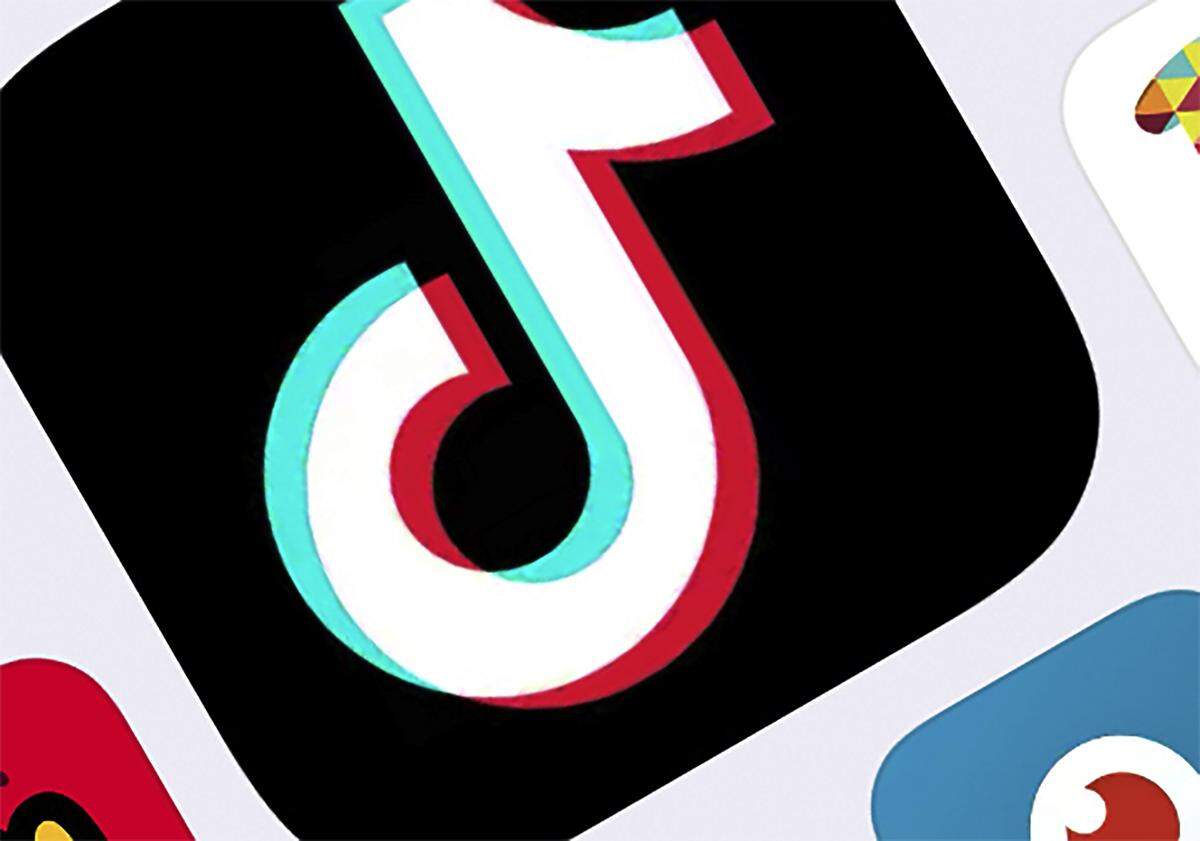 This Tuesday, Feb. 25, 2020 photo shows the icon for TikTok taken in New York. From the perspective of teens flooding onto TikTok, the Chinese-owned online video app is a major new outlet for self-expression, one proudly home to the silly, the loud and the weird. To others, though, the service is an unnerving black box that could be sharing information with the Chinese government, facilitating espionage, or just promoting videos and songs some parents consider lewd. (AP Photo)
