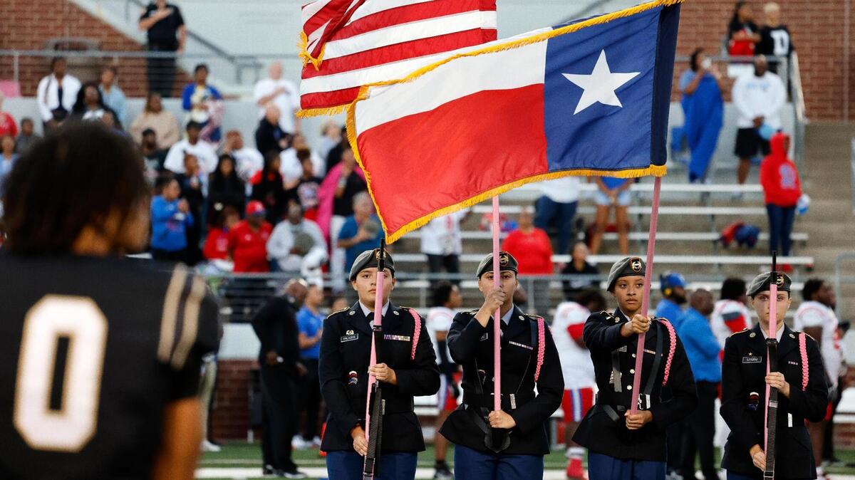 JROTC students present the colors at a football game at Vernon Newsom Stadium in Mansfield in October. Renovating stadiums including Newsom is part of a $777 million bond election before voters this spring.