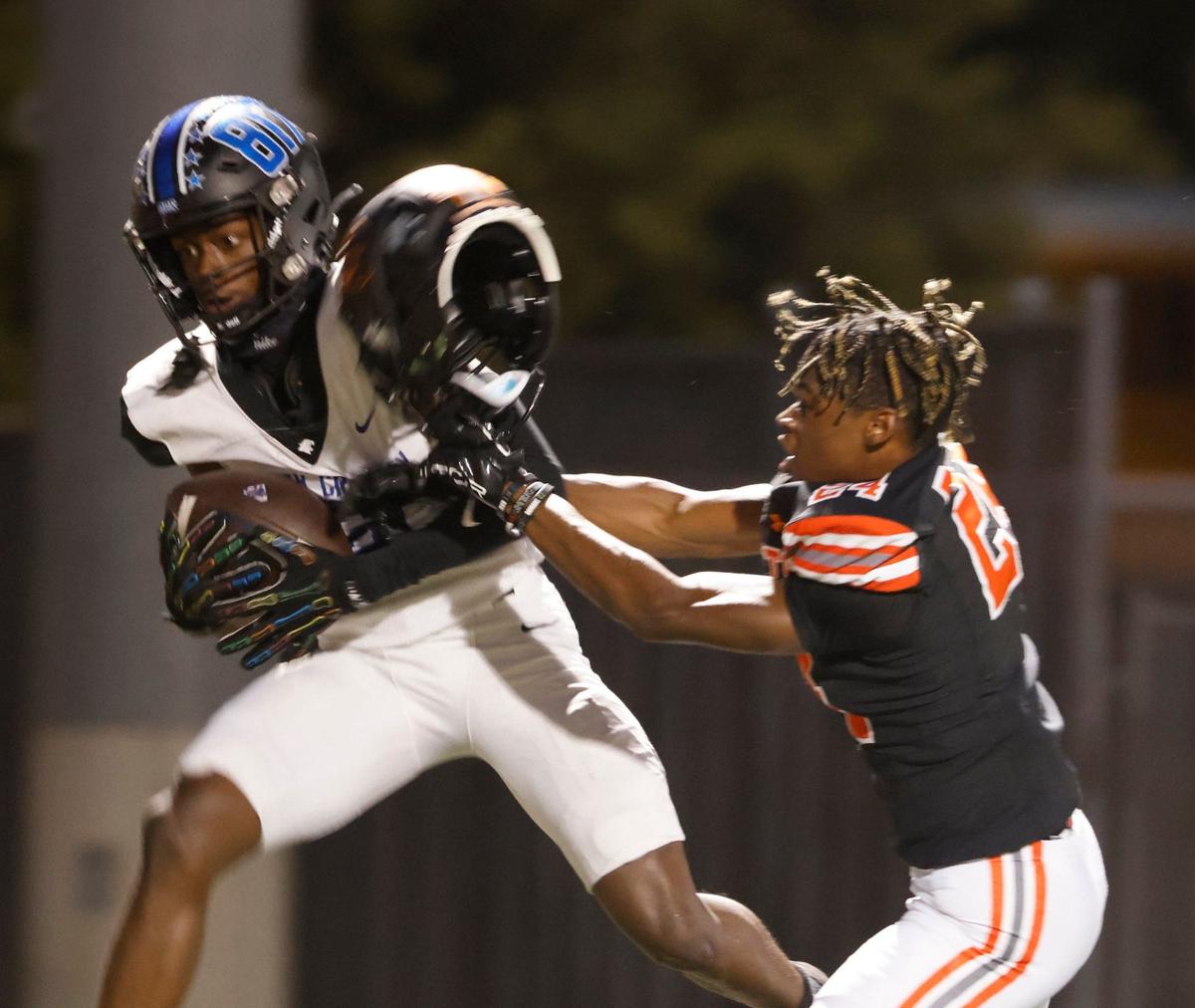 Rockwall cornerback AJ Brown (24) attempts to defend the touchdown pass to North Crowley wide receiver Quentin Gibson (6) during a UIL 6A Conference football game at Wilkerson-Sanders Memorial Stadium in Rockwall Texas, Thursday, Sept. 19, 2024.