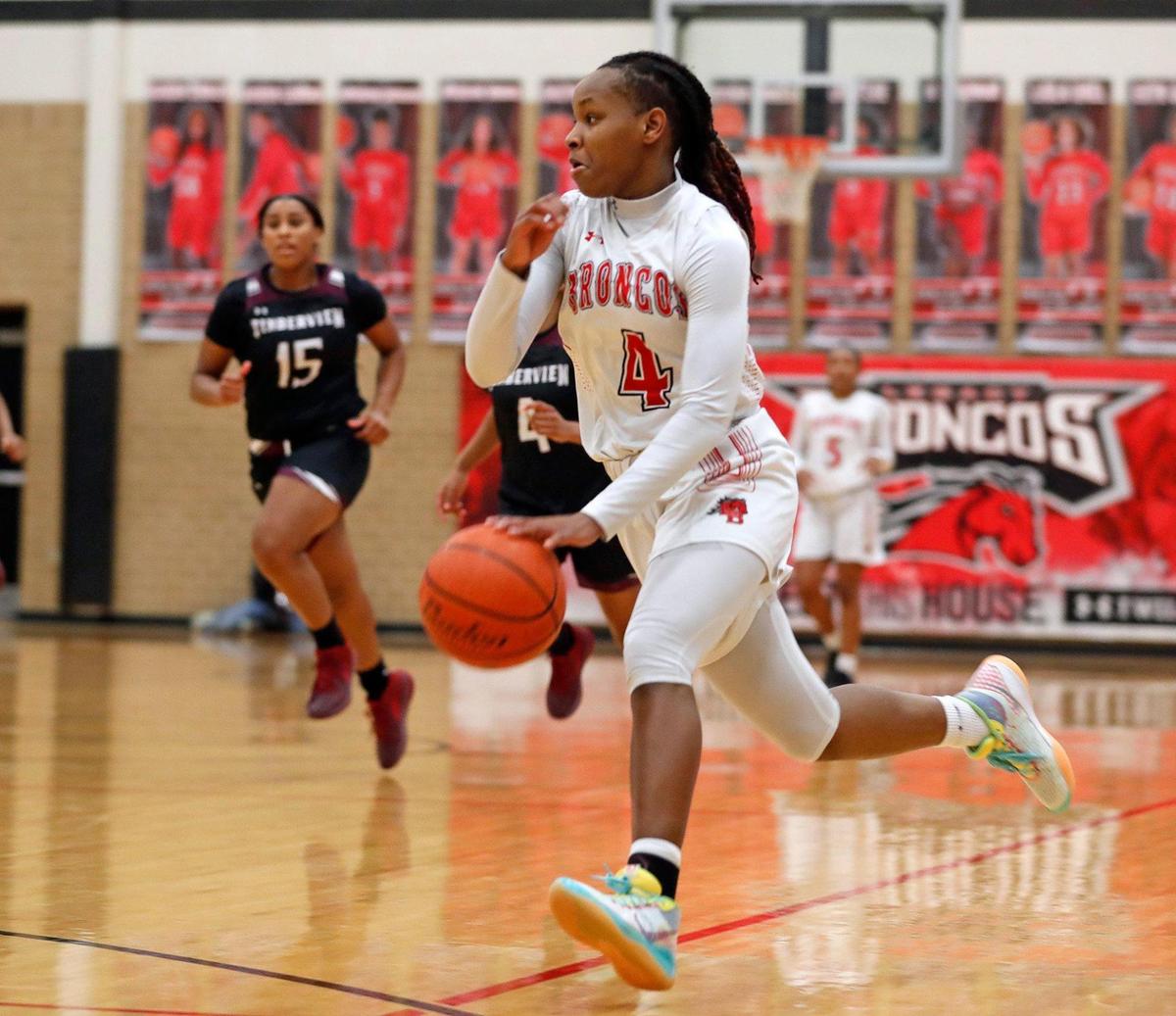 Legacy guard Sirviva Legions (4) crosses the court on a fast break in the first half of a 8-5A district high school girls basketball game at Legacy High School in Mansfield, Texas, Friday, Jan. 22, 2021. The Lady Broncos led the Lady Wolves 22-11 at the half. (Special to the Star-Telegram Bob Booth)