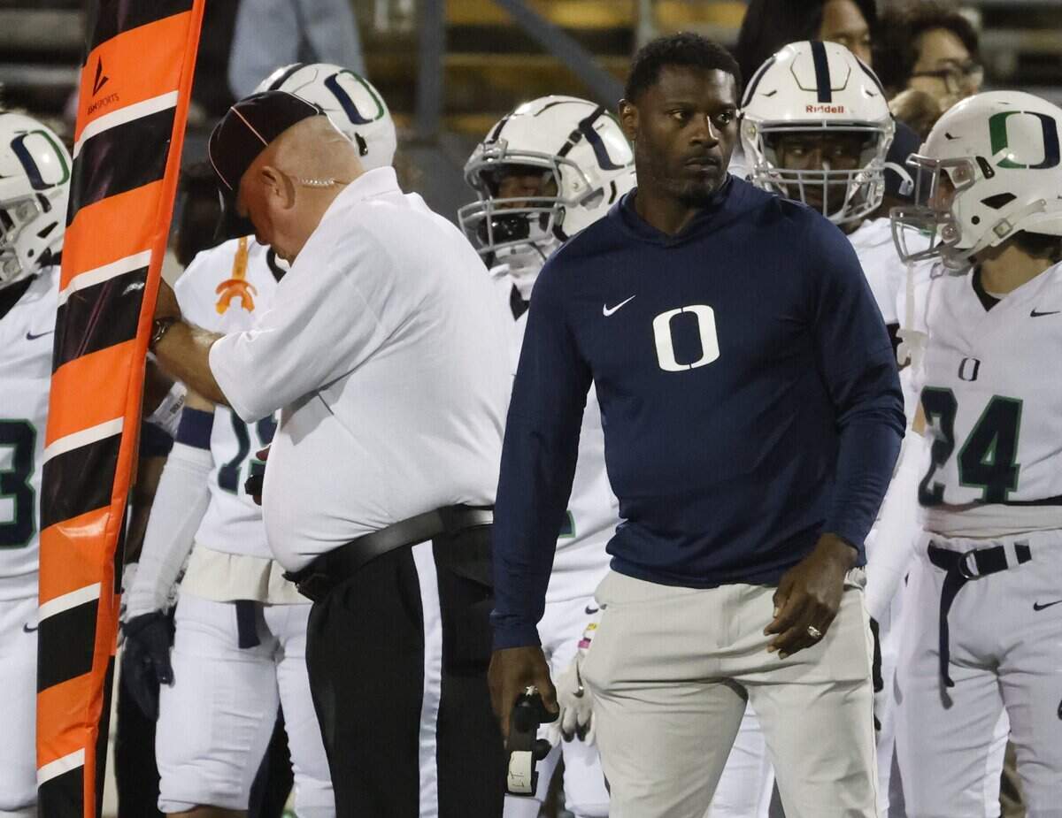 TCU great and Oakridge School run game coordinator LaDainian Tomlinson glances to the end zone during the first half of the SPC 2025 3A Football Championship football game between The Oakridge School and Fort Worth Country Day at Mavericks Stadium in Arlington, Texas, Saturday Nov. 08, 2025.