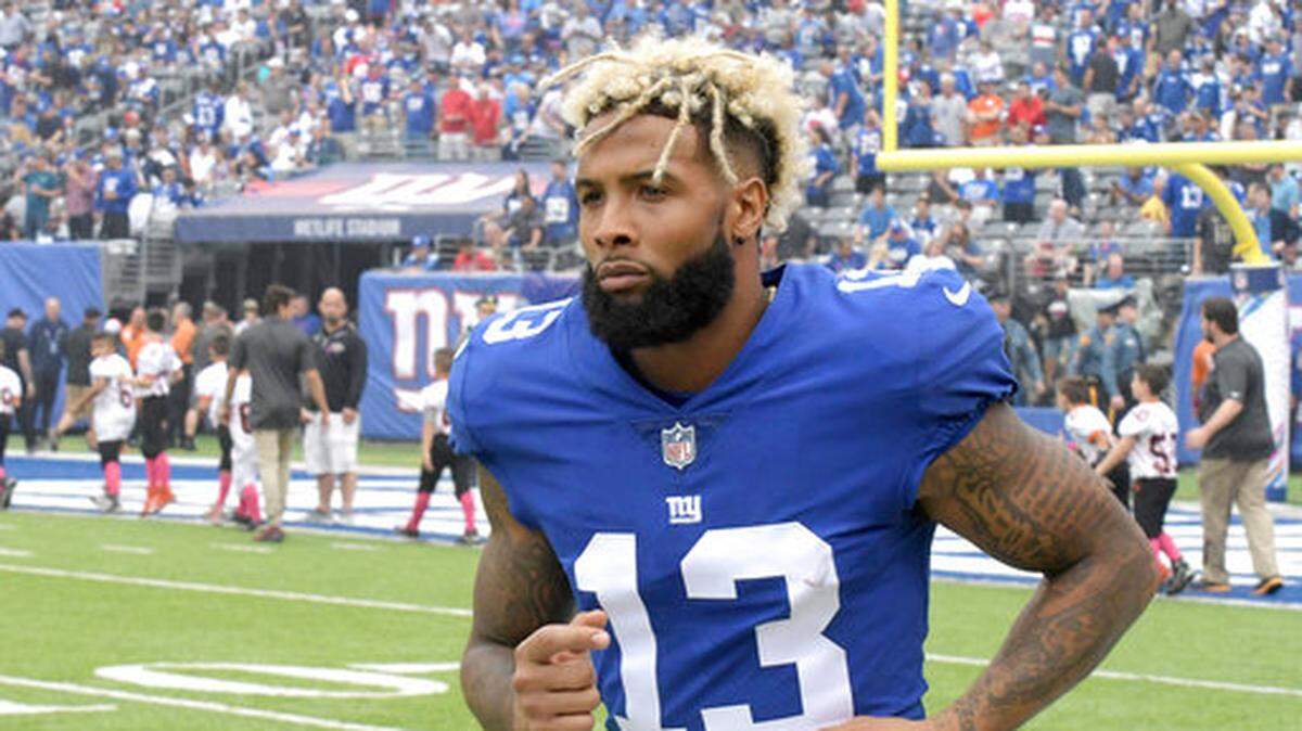 FILE - New York Giants wide receiver Odell Beckham Jr. will stick to his promise and report to training camp on Wednesday (AP Photo/Bill Kostroun, File)