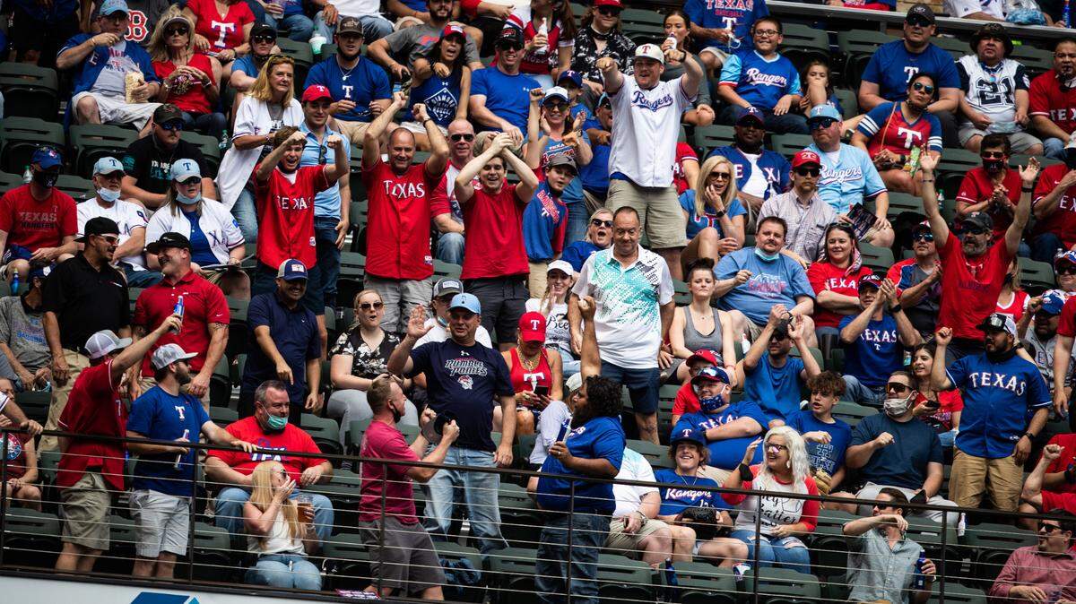 Fans cheer on the Texas Rangers during their home opener April 5, 2021 at Globe Life Field against the Toronto Blue Jays. The Rangers take on the Colorado Rockies on Monday, April 11 in this season’s home opener.