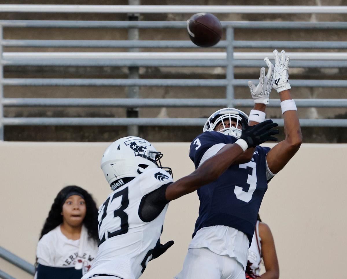 Denton Ryan wide receiver Lorenzo Hill (3) catches a pass defended by Timberview defensive back Davin Hill (23) during a UIL football game at C.H. Collins Activity Complex in Denton, Texas, Thursday, Sept. 05, 2024.