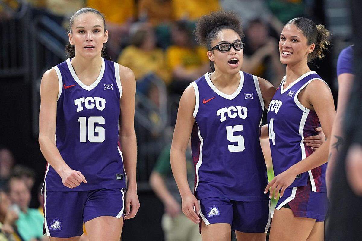 WACO, TEXAS - FEBRUARY 12: Olivia Miles #5 of the TCU Horned Frogs reacts along with teammates Clara Bielefeld #16 and Donovyn Hunter #4 during the second half against the Baylor Bears at Foster Pavilion on February 12, 2026 in Waco, Texas. (Photo by Scott Wachter/Getty Images)
