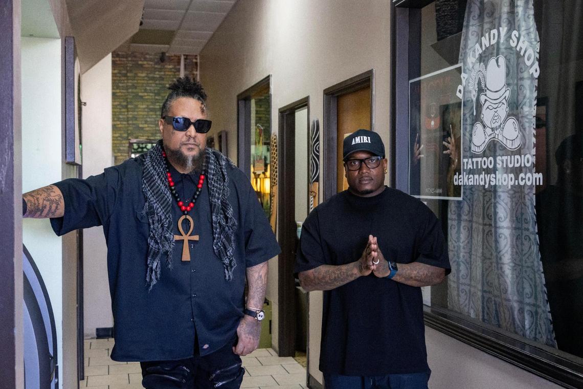 James Lomax, who goes by OG Poppy, left, and Mike Montgomery partnered together to open Da Kandy Shop Tattoo Studio over two decades ago.