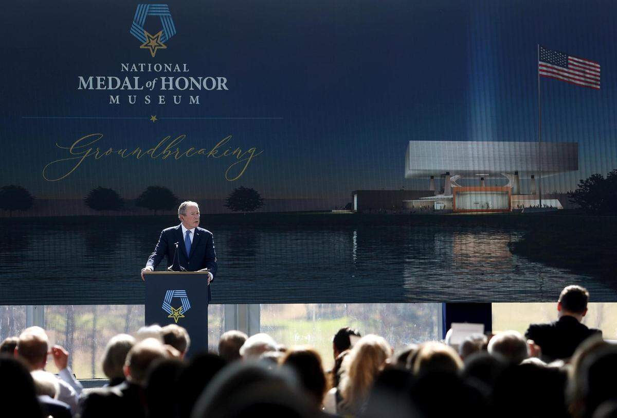 President George W. Bush speaks during the groundbreaking for the National Medal of Honor Museum in Arlington on March 25, 2022.
