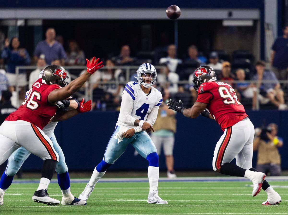 Dallas Cowboys Dak Prescott throws the ball during the first half of the game against Tampa Bay Buccaneers on Sunday, Sept. 11, 2022, at AT&T Stadium in Arlington.
