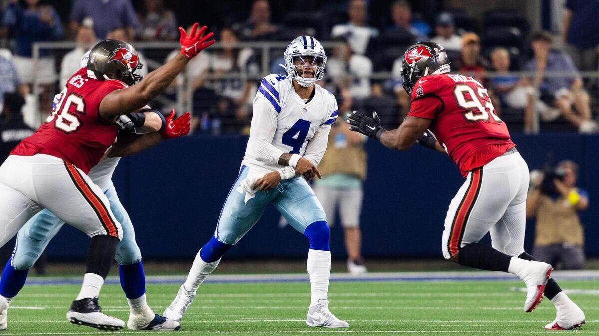 Dallas Cowboys Dak Prescott throws the ball during the first half of Sunday’s game against the Tampa Bay Buccaneers on Sunday at AT&T Stadium in Arlington. Prescott injured his right hand late in the fourth quarter and left the game.