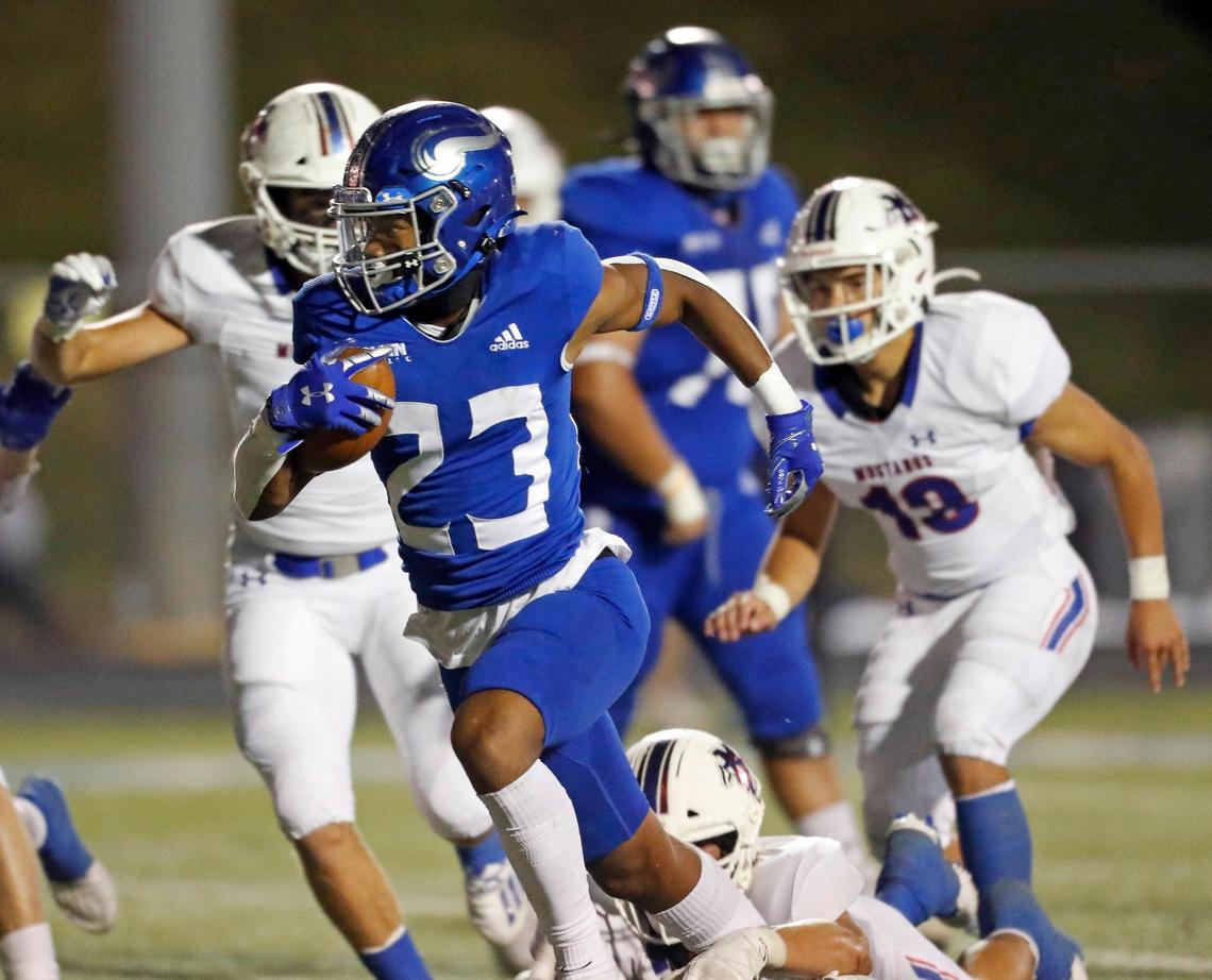Nolan Catholic running back Sergio Snider (23) outruns the Mustang defense during a high school football game at Doskocil Stadium in Fort Worth, Texas, Friday, Oct. 02, 2020. Nolan Catholic defeated Midland Christian 38-21. (Special to the Star-Telegram Bob Booth)