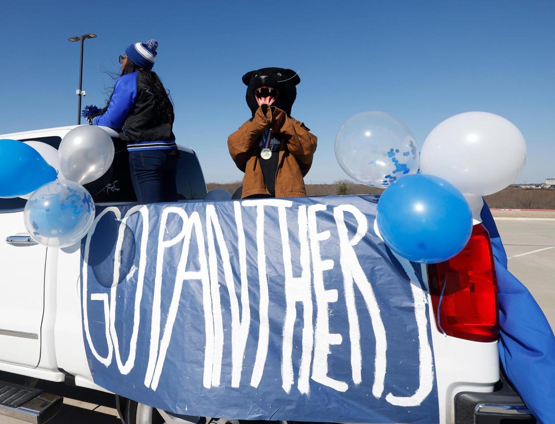 Even the North Crowley Panther mascot had to bundle up for the cold temperatures during the UIL 6A D1 Championship Parade at Crowley ISD Multi-purpose Stadium in North Crowley, Texas, Saturday, Jan. 18, 2025.