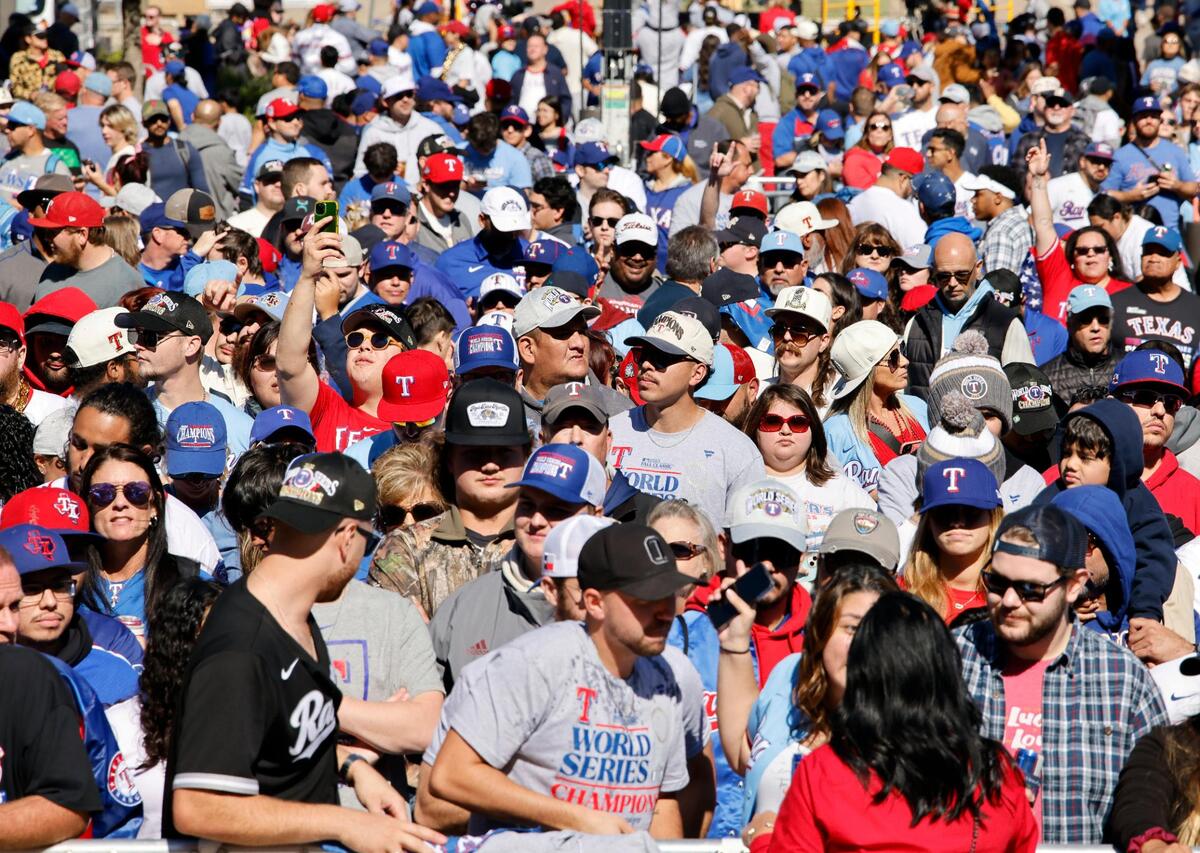 Fans wait in front of the stage in the post parade celebration area during the Texas Rangers World Series Parade in Arlington, Texas, Friday, Nov. 03, 2023. (Special to the Star-Telegram Bob Booth)