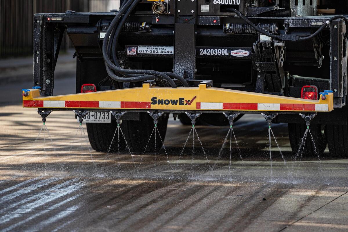 A city-sanction brine truck sprays brining solution on the street in preparation for the winter storm on Presidio Street in Fort Worth on Wednesday, Jan. 8, 2024.