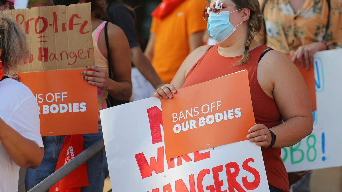 Abortion rights supporters gather to protest Texas SB 8 in front of Edinburg City Hall on Wednesday.