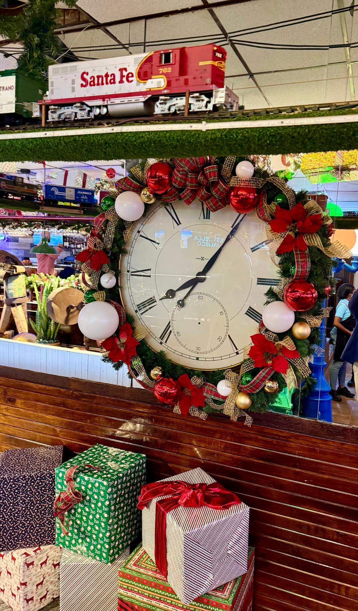 The toy train circles above Christmas decorations at the new Campo Verde Bar & Grill, a general restaurant that replaced a fajitas-and-margaritas hangout in Dalworthington Gardens, Texas, seen June 5, 2025.