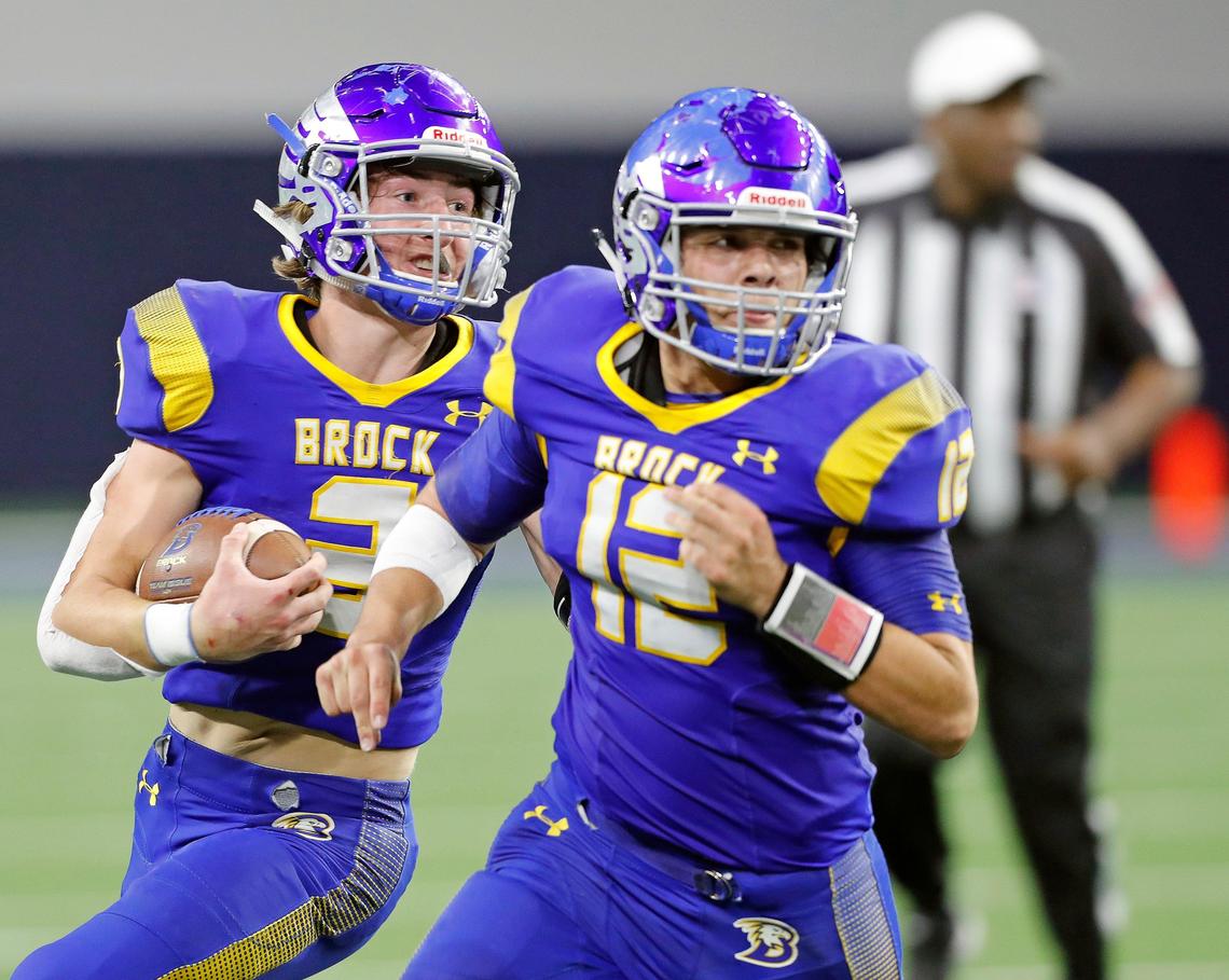 Brock running back Cash Jones (3) follows the lead of running back Jesse Hallmark (12) in the first half of the 3A division I state semifinal championship football game at Ford Center in Frisco, Texas, Thursday, Dec. 12, 2019. Brock led 21-17 at the half. (Special to the Star-Telegram Bob Booth)